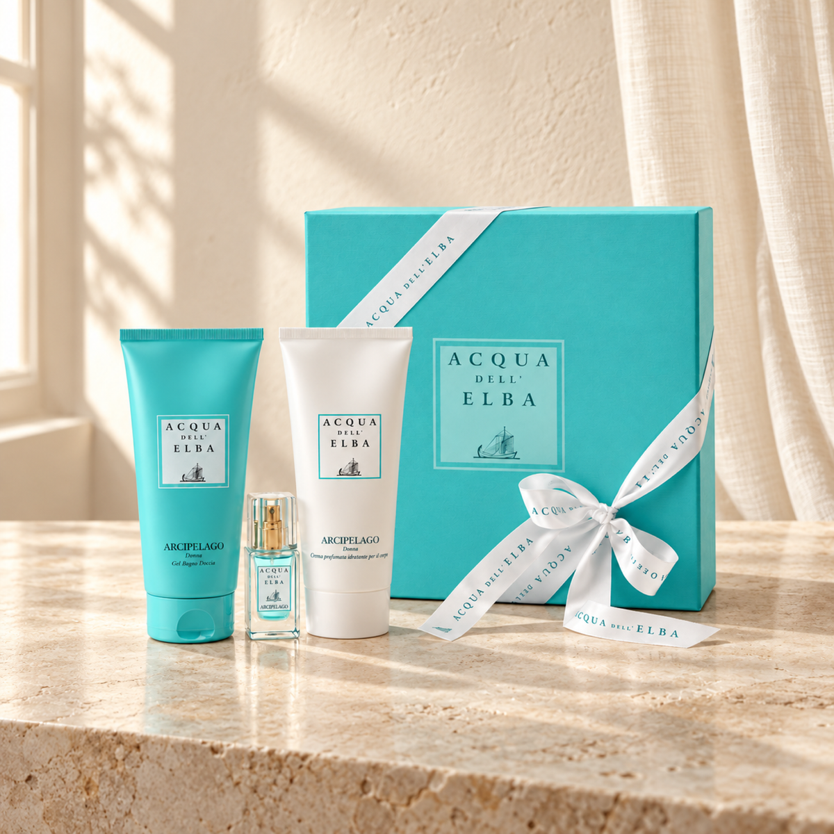 GIFT BOX ARCIPELAGO WOMAN - BODY CREAM + SHOWER GEL + EDP — complete gift set, natural window-light lifestyle