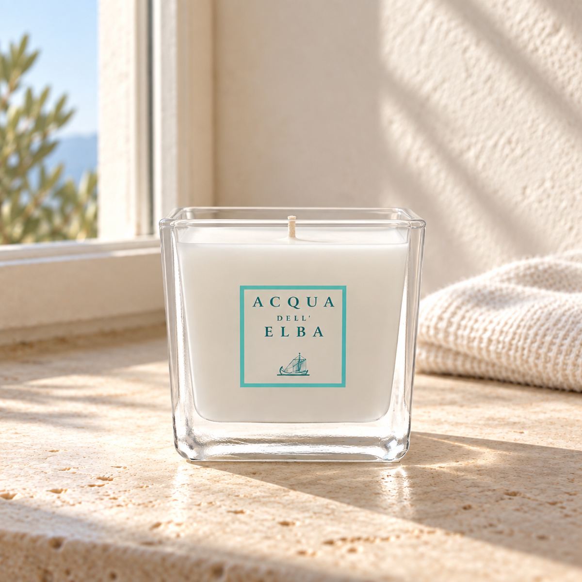 Acqua dell’Elba scentedcandlemare — natural window-light lifestyle